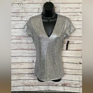 Women's size Medium silver metallic top by INC